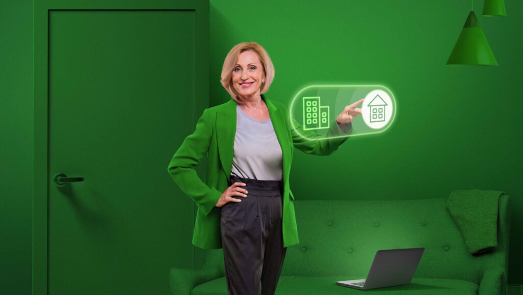 Woman selecting home vs office on glowing hybrid-work display.